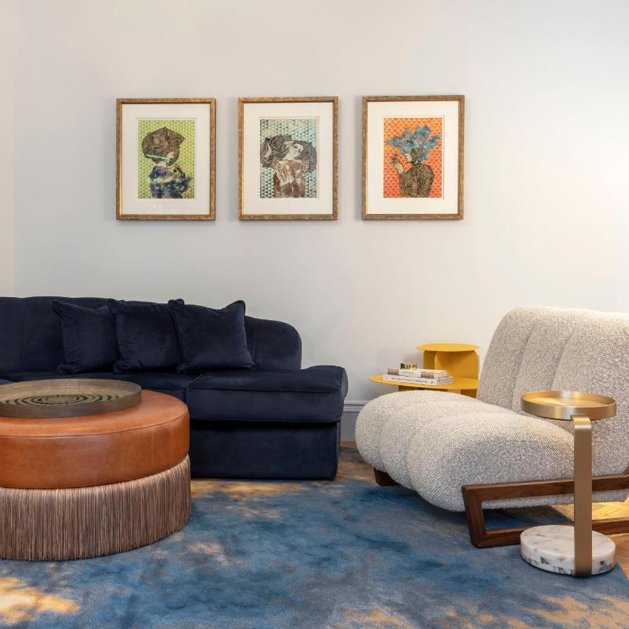 Virgin Hotels Эдинбург Экстерьер фото A living room with a sofa, armchair and ottoman